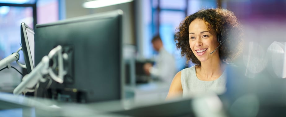 a female call centre worker takes a call.