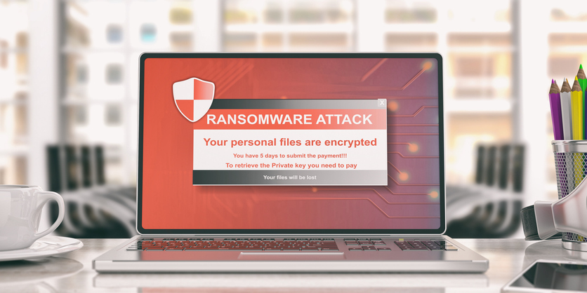 Ransomware alert on a laptop screen - office background. 3d illustration