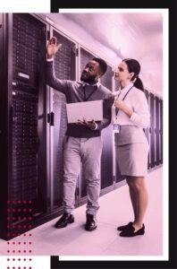 Custom IT Support for Your Industry - IT officer discussing issues with intern