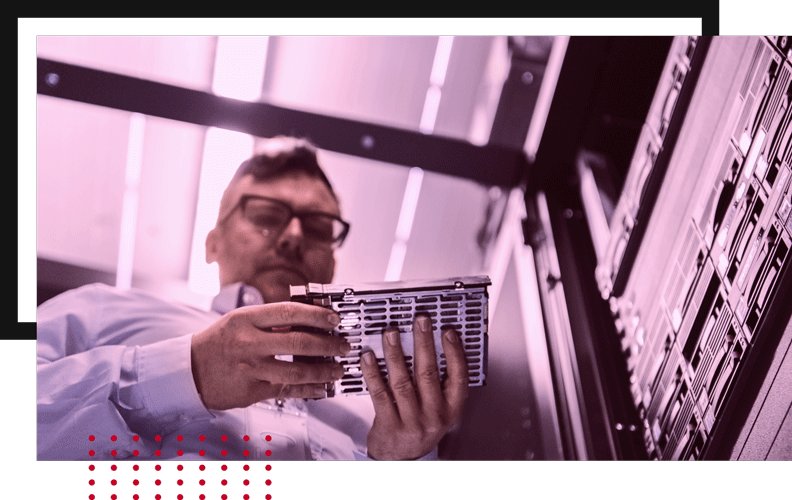 Private Cloud Hosting - IT expert holding a hard drive
